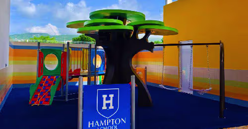 Hampton: A colorful educational environment featuring playful panels and activities supporting motor development.
